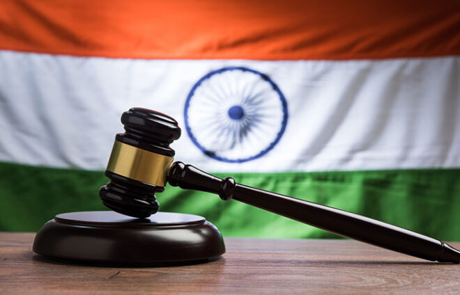 indian-law-concept-showing-wooden-gavel-indian-flag-(1)